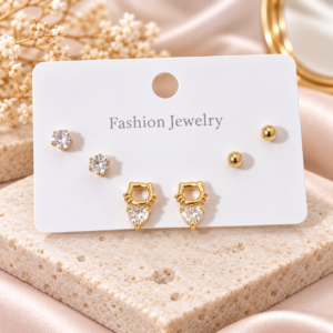 3 paires de boucles d’oreilles dorées avec cristaux