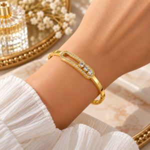 Bracelet jonc doré à trois zircons