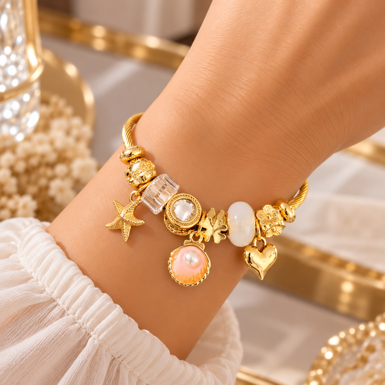 Bracelet Femme Doré à Breloques Étoile de Mer & Coquillage