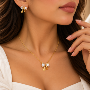Ensemble Collier et Boucles d’Oreilles Doré – Nœud Papillon et Étoiles